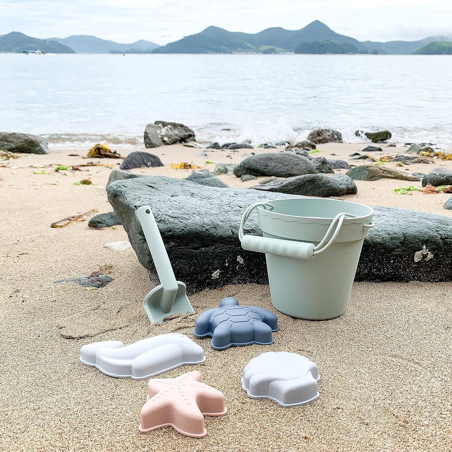 imageBLUE GINKGO Silicone Beach Toys Modern Baby Travel Friendly Toys Set Silicone Bucket Shovel 4 Sand Molds Beach Bag Sand Toys for Toddlers Kids YellowGreen